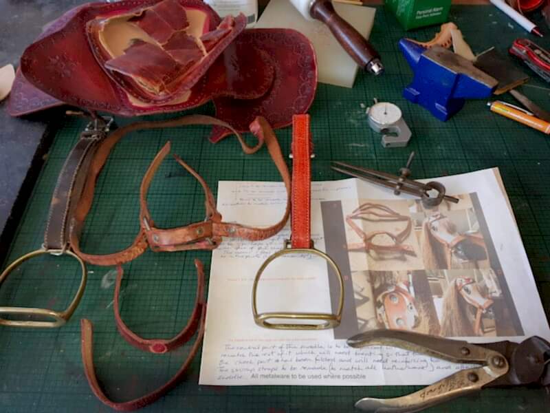Red leather rocking horse saddle and tack